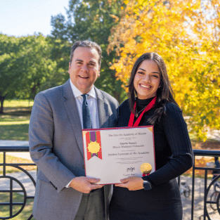 IWU President Sheahon Zenger with Lincoln Laureate recipient Valeria Suarez