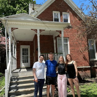 students in front of vacation rental property