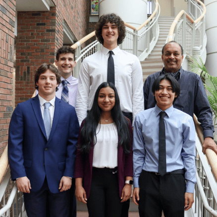 Professor of Chemistry Ram Mohan with IWU research students