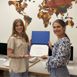 Hovde and Kerr with Technos certificate